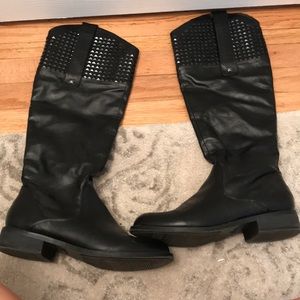 Black studded knee high boots
